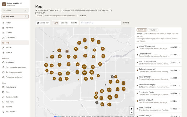The Omnira One Map page for a sample electrical contractor, around a large desert city in the Southwest. Numbered circles group customers across the metro area. Buttons switch layers and between light, satellite and streets maps, and a side list ranks the customers in view by value, with a tab for today's jobs.